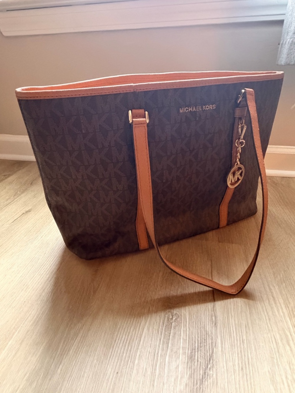 Michael Kors Brown Monogram Tote with Tan Trim and MK Charm
